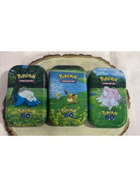 Pokémon GO Mini Tins Lot of 3 Snorlax Eevee Blissey Empty Collectible Empty